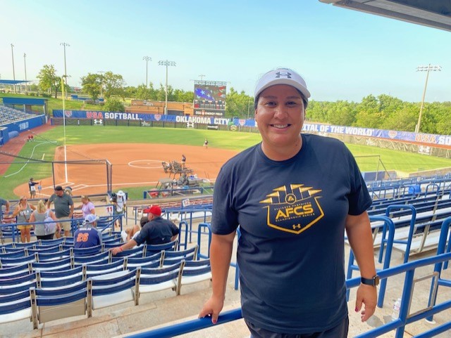 Coach Amber Flores poses for a picture at at Hall of Fame Stadium in Oklahoma City after coaching in the Alliance All-Star Game on July 27