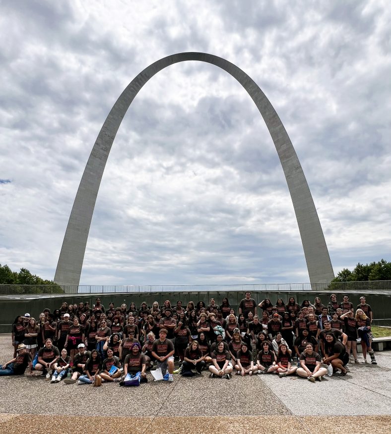 SSC Upward Bound participants who recently completed the 9th, 10th and 11th grades stand in front of the St. Louis Arch during their summer trip.