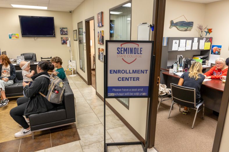 In this photo, students wait to meet with enrollment management staff at SSC.