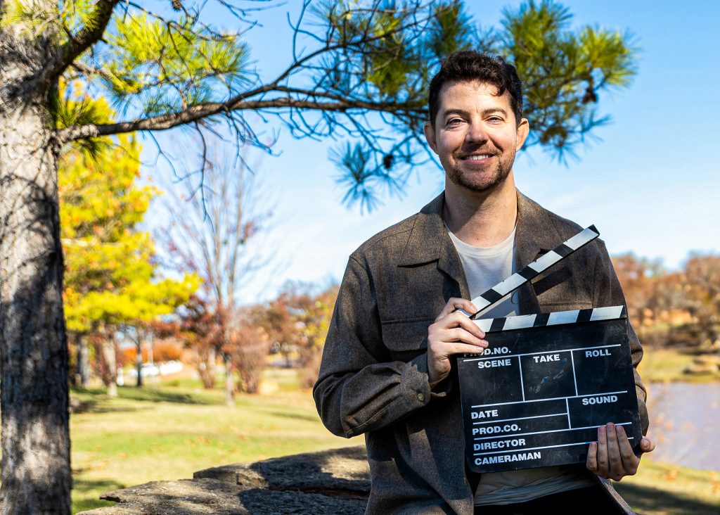 Matt Kappele poses in front of the pond on SSC's campus.