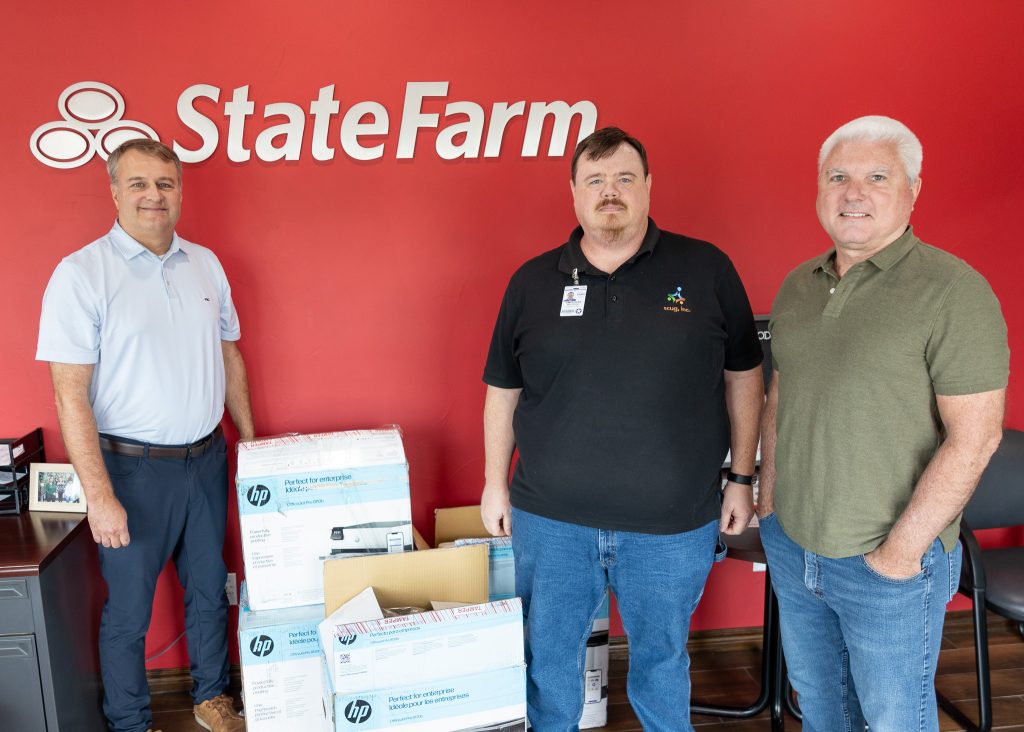 In this picture, left to right, State Farm Agent and SSC Educational Foundation Trustee Darren Frederick, SSC Chief Information Security Officer and IT Director Marc Hunter and SSC IT Technician Michael Murray pose for a photo.