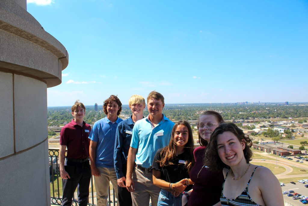 Pictured (left to right): Hanlon Gottschalk of Prague, Hunter Gibson of Cashion, Bradley Ruby of Oklahoma City, Ethan Rich of Prague, Zoe Trenchard of Lewisville, Texas, Audra Provaznik of Prague and Addison Pringle of Shawnee pose for a photo on the balcony atop the Capitol Dome.