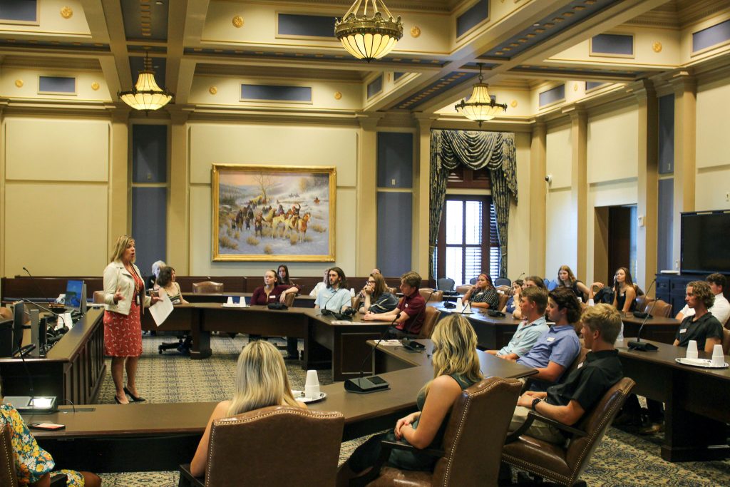 In this photo, Misha Mohr, Public Information Officer for the Oklahoma State Election Board, explains election procedures in the state and encourages students to register to vote for the upcoming election.