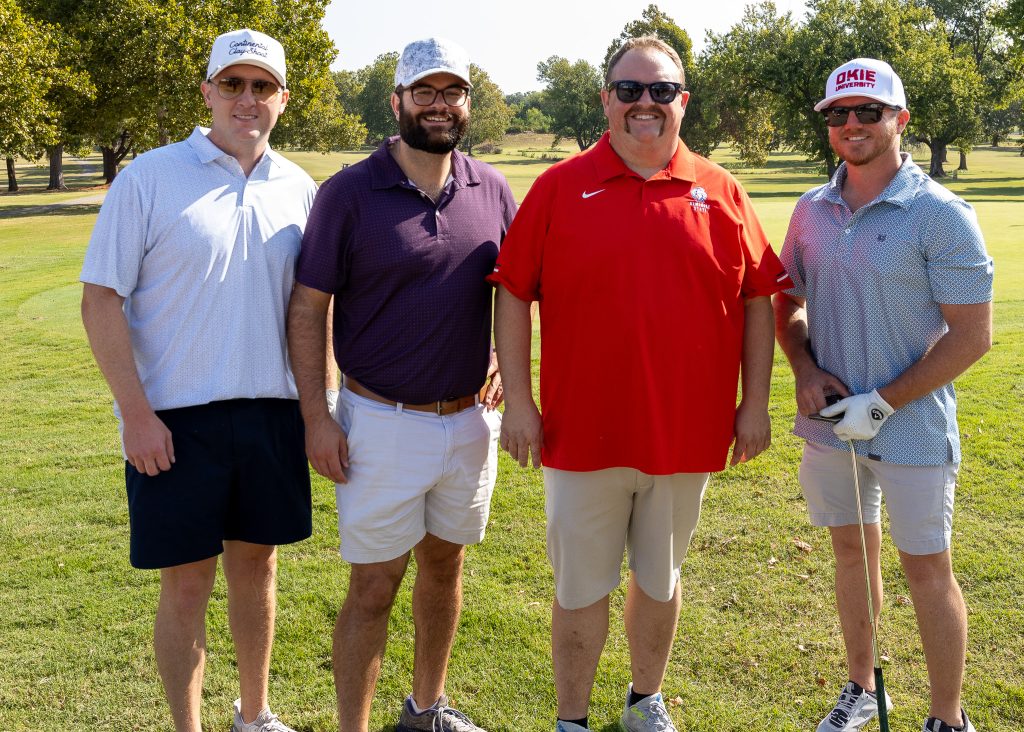 Pictured (left to right): Blayne Norman, Assistant District Attorney for Hughes County; Chris Hauger, Assistant District Attorney for Seminole County; Ryan Pitts, SSC Regent and Holdenville and Wewoka Municipal Judge; and Matt Peters, Asher and Maud Municipal Judge, take a break from their round of golf to take a photo.