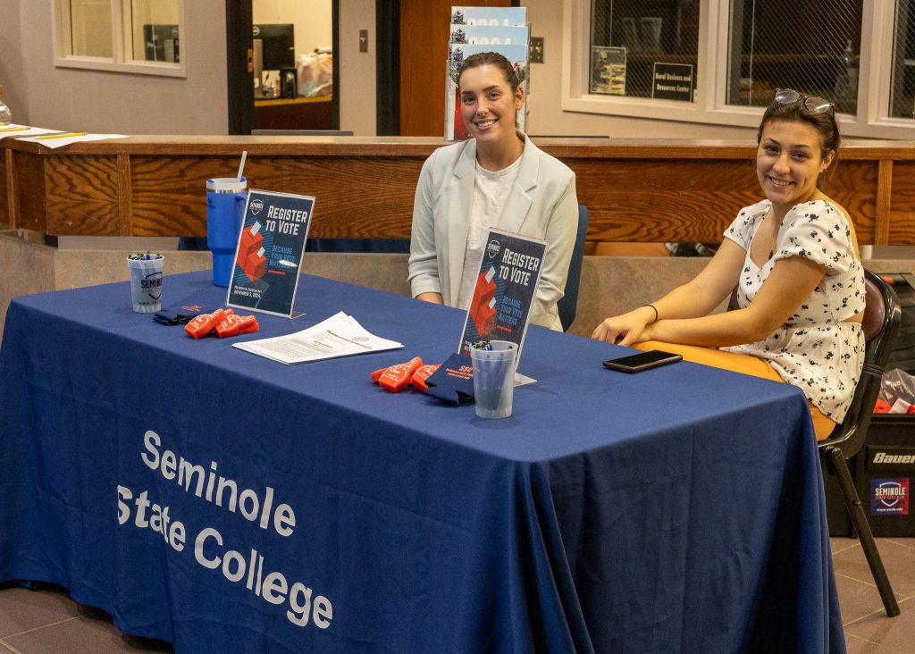 In this photo, SSC Student Government Association Sponsor and Recruitment Specialist Maddy Potter (left) and SGA member Aubree Wilkins of Earlsboro (right) help students register to vote at the event.