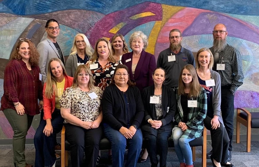 Pictured posing for a group photo are several SSC employees, who attended the conference. Pictured (back row, l-r): Jessica Isaacs, Brad Schatzel, Mechell Downey, Tina Savage, Angela Harjo, Lana Reynolds, Dwayne Castle, Kevin Davidson; (front row, l-r) Emily Carpenter, Sheila Morris, Tina Morris, Dana Denwalt, Tisha Simon and Kim Pringle.