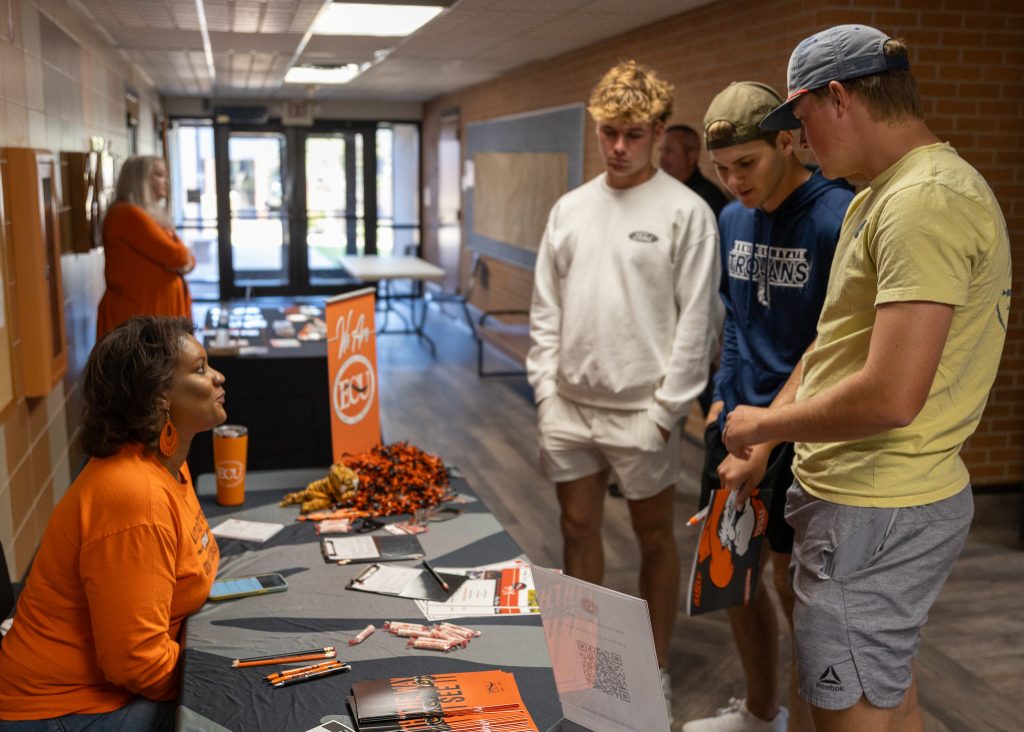 In this photo, SSC students speak with a representative from East Central University.