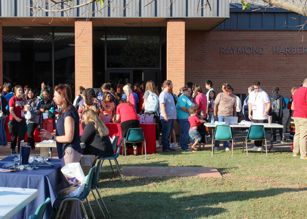 In this photo a large crowd of attendees browse the tribal resource fair, which featured more than 30 vendors.