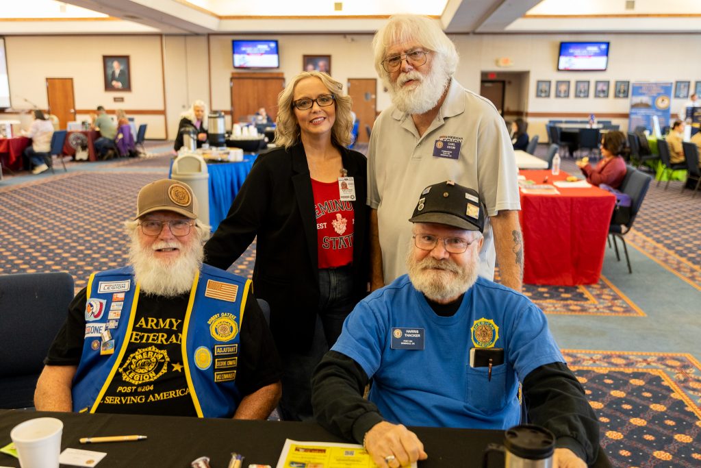 In this photo, American Legion Post 204 Vice Commander Robert Gatzke, SSC VA School Certifying Officer Stacey Foster, Post 204 Commander Carl Odom and Post 204 member Harris Thacker pose for a photo at the event. The American Legion donated 5,000 American flags that were planted across campus in recognition of the event and the Veteran’s Day holiday.