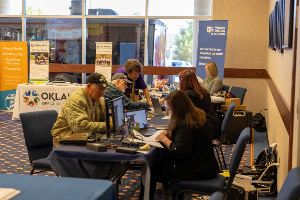 In this photo, veterans can be seen talking with different representatives of various veteran support groups. 