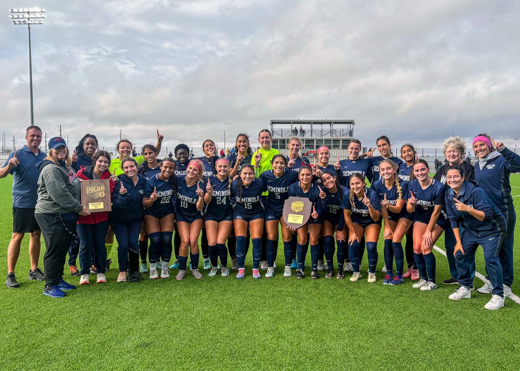 In this photo, the SSC Soccer team poses for a group picture after their NJCAA Region II and South Central District Championship win on Nov. 3