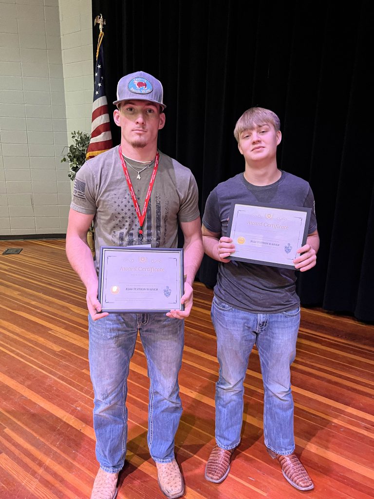 Pictured are two attendees who won tuition waivers at the event, Kyle Earnest, a senior at Okemah High School, and Jacob Beck-Coleman, a junior at Stroud High School.