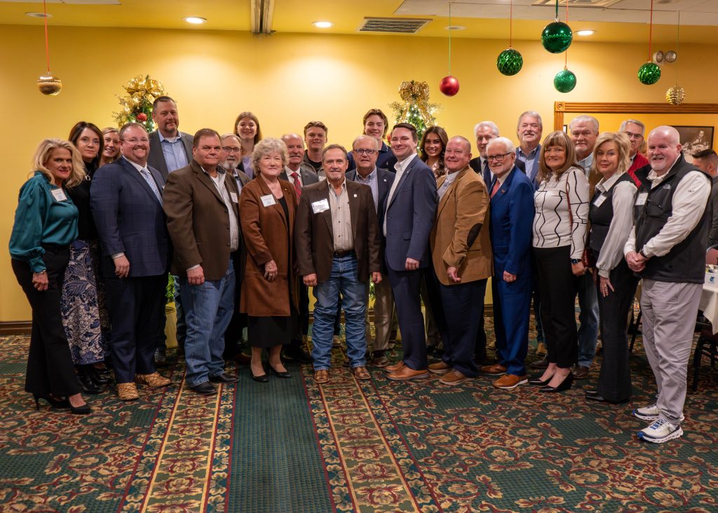 Posing for a group photo, Seminole State College employees, Regents, Foundation Trustees, local community supporters, legislators and students show their support at the Oklahoma State Regents for Higher Education’s Southeast Region Legislative Briefing at Pete’s Place in Krebs on Dec. 3.