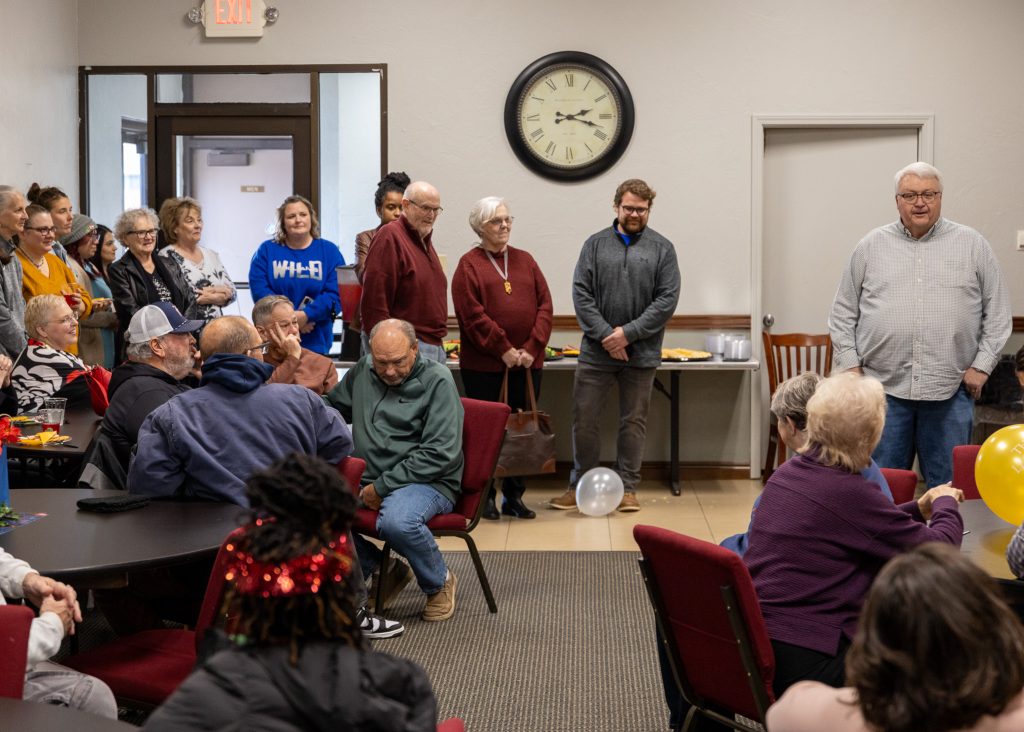 In this photo, Cobb talks about his time working at SSC and thanks the crowd of family, friends and colleagues for attending the reception.