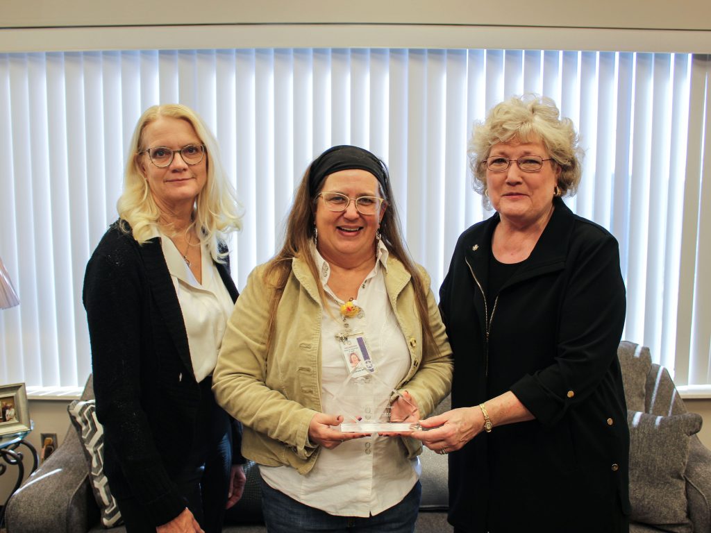 In this photo, Kimberly Ramsey, Adolescent Health Specialist with the Oklahoma State Health Department (center). poses for a photo with Mechell Downey, Director of Board Relations and Administrative Operations (left), and SSC President Lana Reynolds (right).