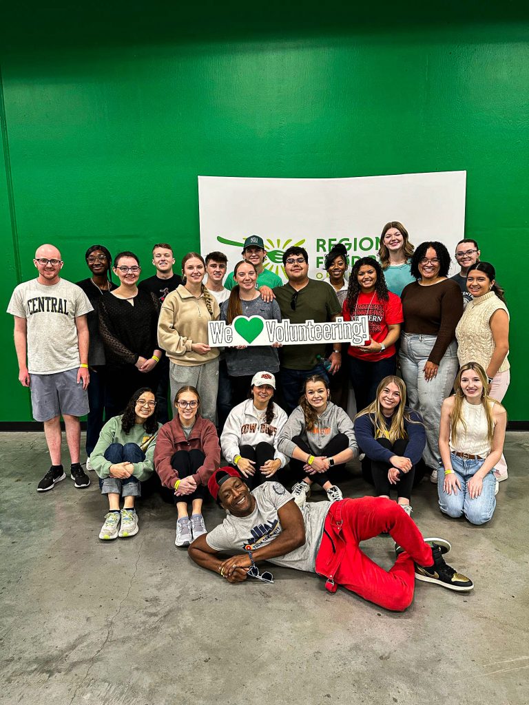 In this photo, Melanie Long joins other attendees of the leadership academy to lend a hand at the Regional Food Bank in Oklahoma City on Feb. 3.