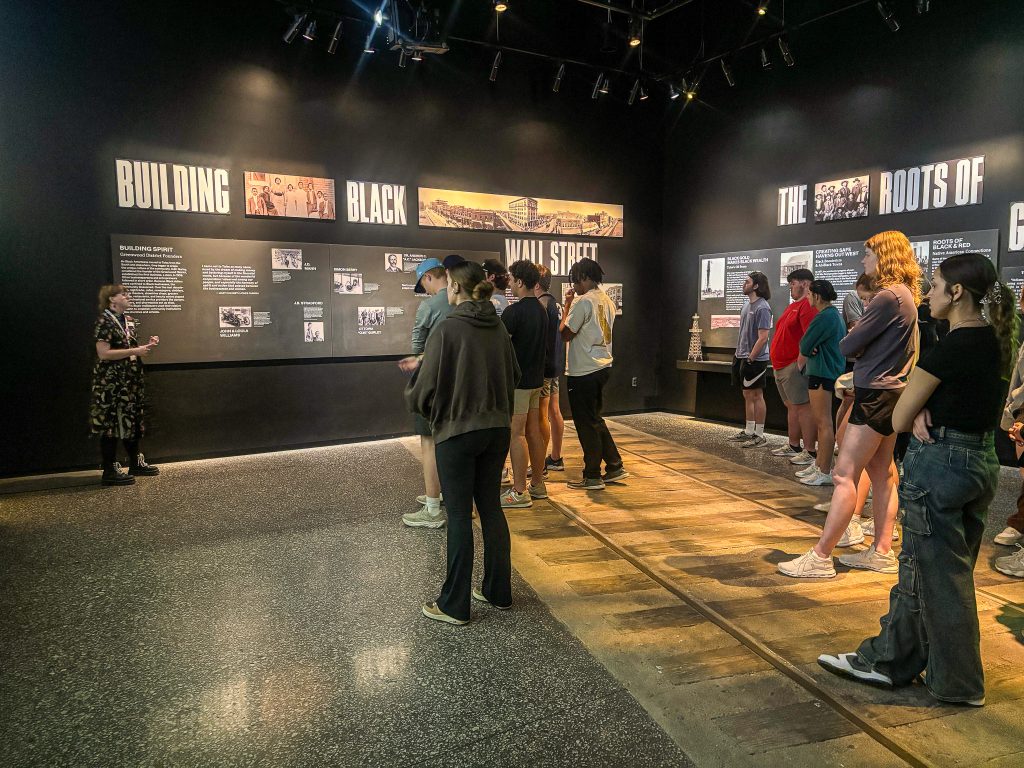 In this photo, SSC leadership students look on during a tour of the Greenwood Rising Black Wall St. History Center in Tulsa.