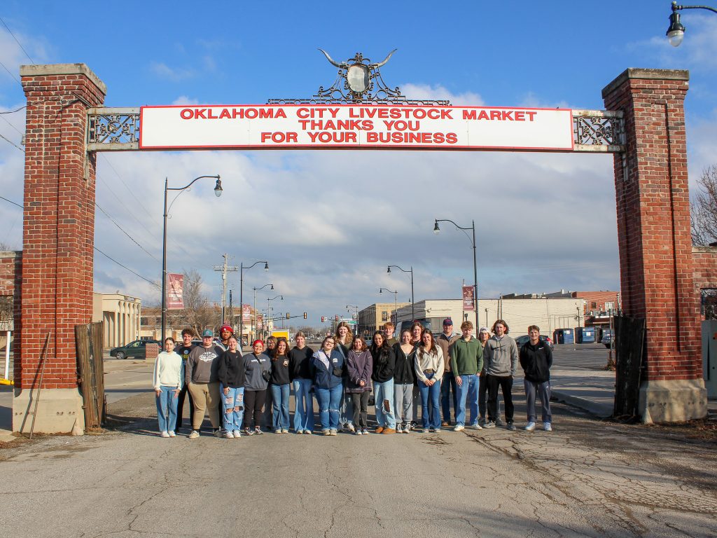 In this photo, members of the Seminole State College President’s Leadership Class pose for a group picture in front of the Oklahoma National Stockyards