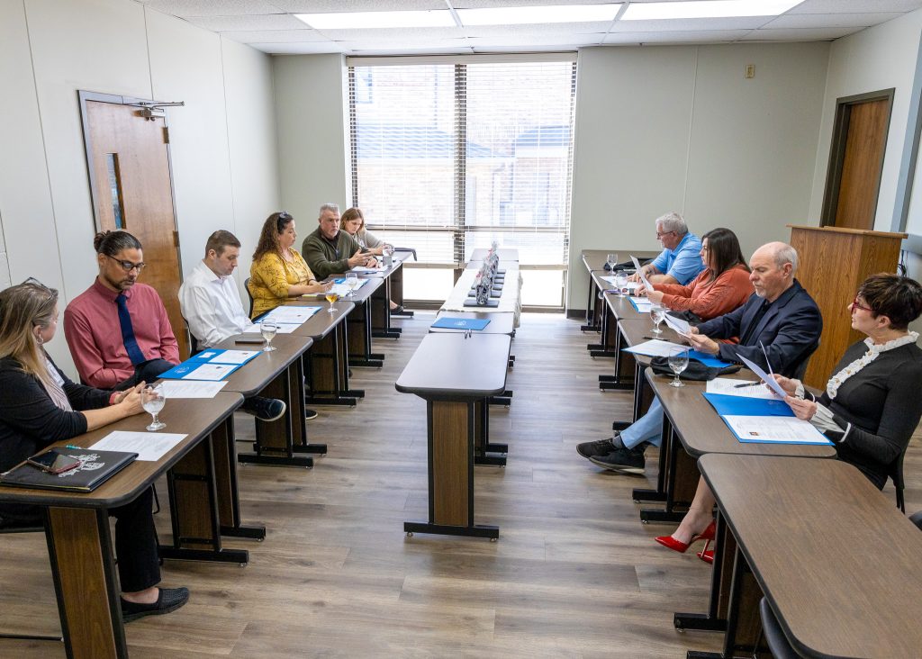 In this photo, Faculty members from Seminole State College’s Business and Education division meet with local business leaders during a Business Advisory Meeting. Pictured (left to right): SSC Business and Education Division Chair Tammy Kasterke, Assistant Professor Brad Schatzel, Edward Jones Financial Advisor Mitch Enos, Seminole Chamber of Commerce CEO Amy Britt, Assistant Professor Stephen Brooks, Business and Education Division Office Manager Tabatha Lusk, SSC Rural Business and Resources Center Director Danny Morgan, SSC Business and Industry Coordinator Talina Lee, Seminole City Manager Steve Saxon and South Central Industries CEO Tina Hanna.