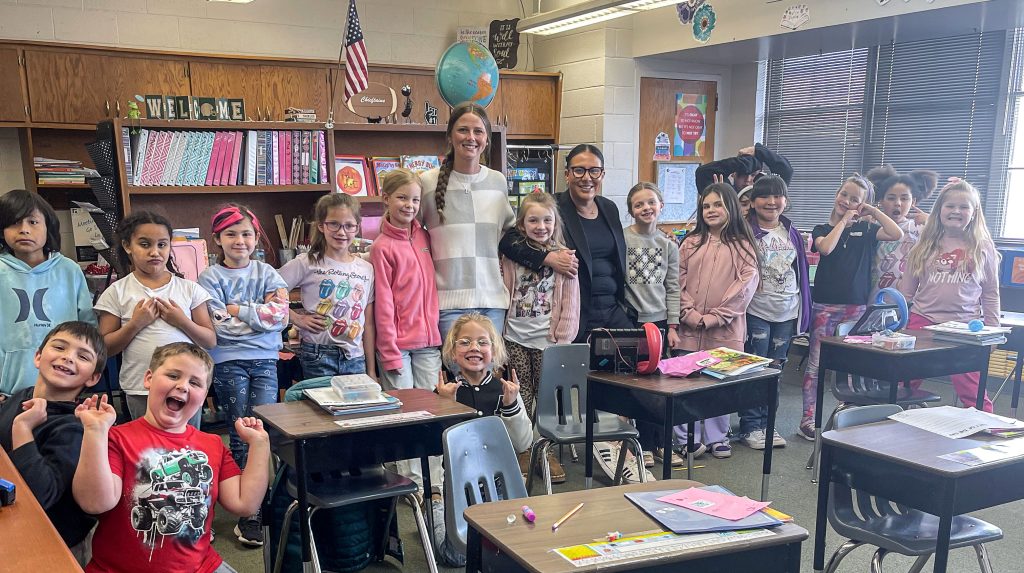 In this picture, SSC Assistant Volleyball Coach Bobbi Leitha and Softball Head Coach Amber Flores pose for a photo with Mrs. Marley’s class following their reading on March 6.