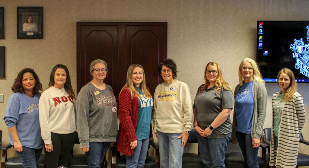 In this photo, posing as a group are Presidents’ assistants from colleges across the state. Pictured (left to right): Michelle Nutter, Rose State College; Denise Bay, Northern Oklahoma College; Kinzi Hull, Redlands Community College; Courtney Payne, Carl Albert State College; Candace Raney, Eastern Oklahoma State College; Derotha Rivenbark, Connors State College; Mechell Downey, Seminole State College; and Tisha Simon, Seminole State College.